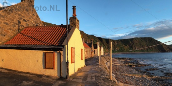 Woningen bij zonsondergang