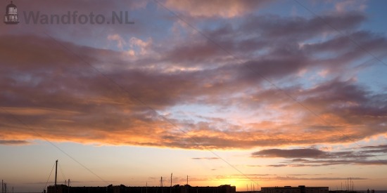 Zicht op Marina Seaport en Zonsondergang