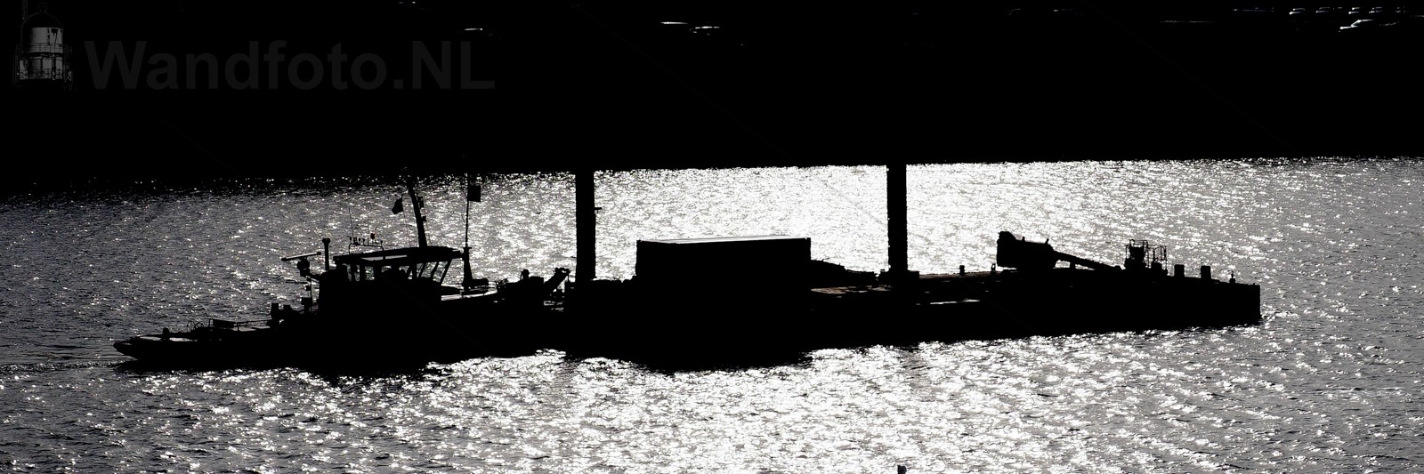 Sleepboot Ida met ponton