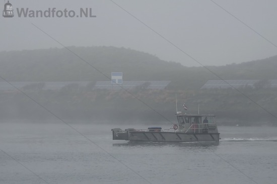 Tender Fortwachter in de mist