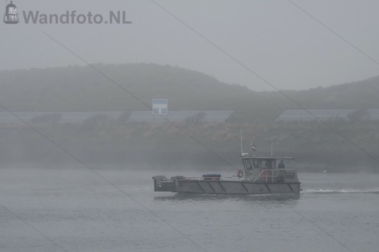 Tender Fortwachter in de mist